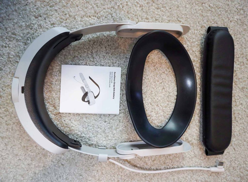 VR head strap laid out with all of its pieces.