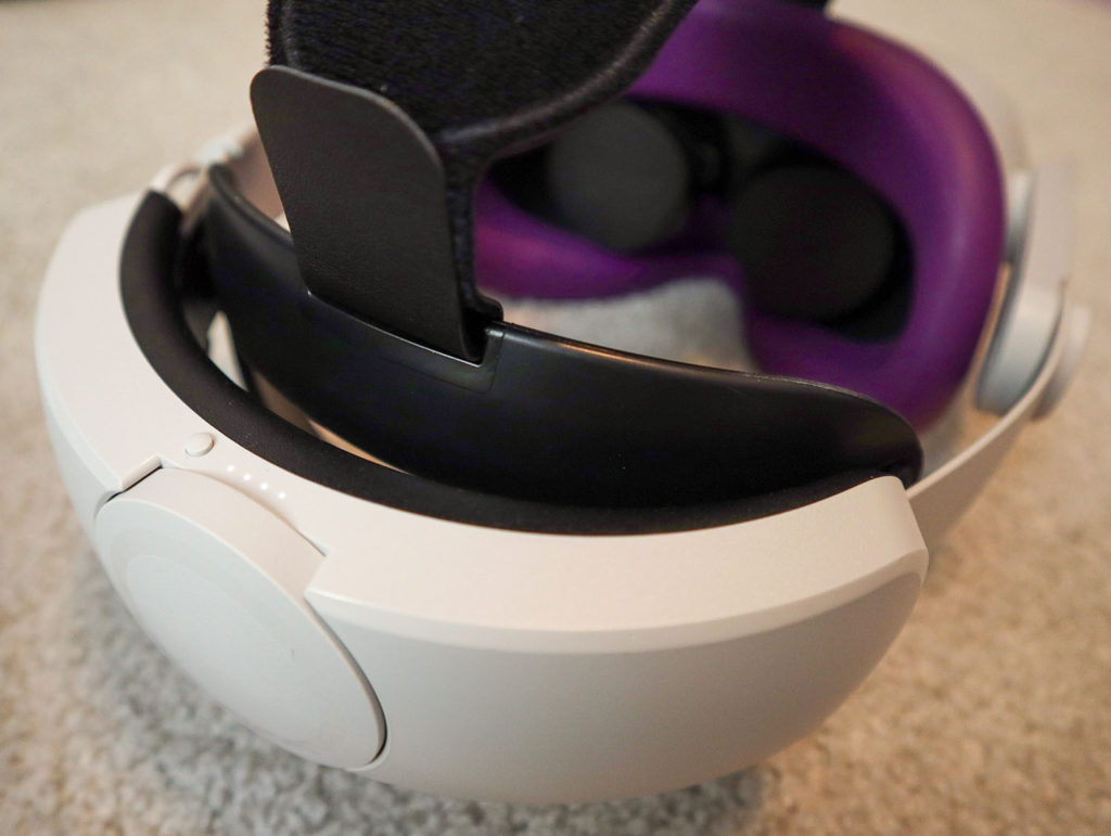 A back view of the ZyberVR Elite Head strap on the Quest 2 with its battery indicator lights lit up.